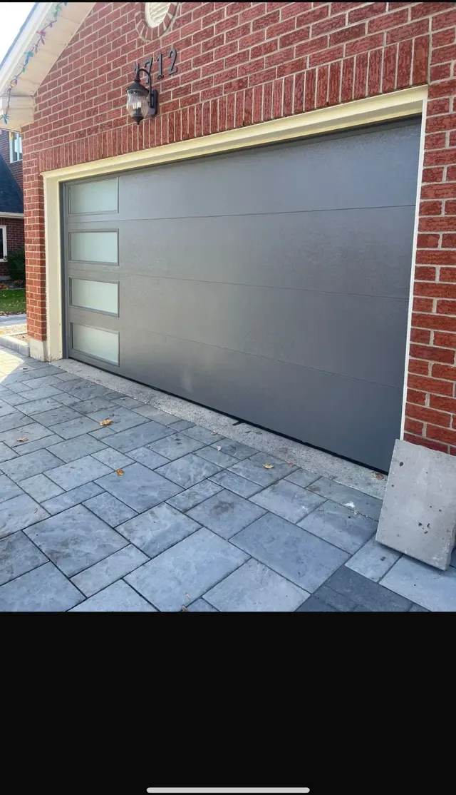 Grey door with side glass panels – Garagetex project photo